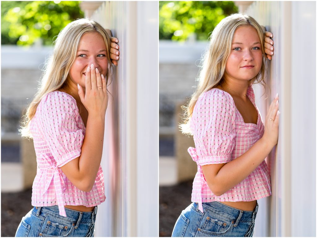 Senior girl poses against white fence for senior pictures in Columbia, Missouri by West Plains, Missouri photographer, Hannah Carr Photography