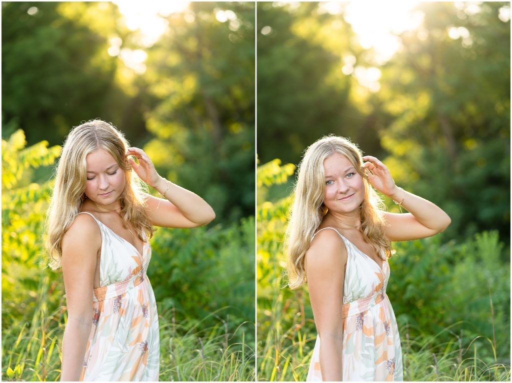 Senior girl wearing a long dress poses in a wildflower field for her senior picture session in Columbia, Missouri by West Plains, Missouri photographer, Hannah Carr Photography