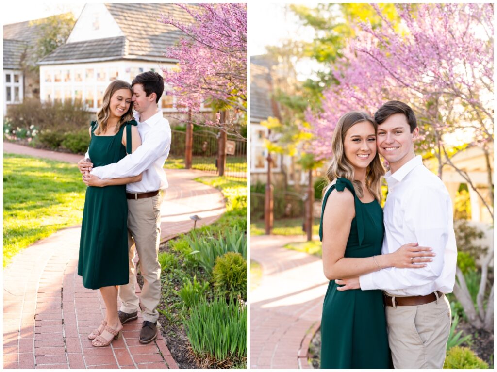 An engaged couple poses in front of the registration building at Big Cedar Lodge for their spring engagement session with Hannah Carr Photography, an Arkansas photographer located in Ash Flat, Arkansas