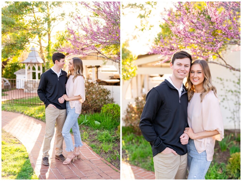 An engaged couple poses in front of the registration building at Big Cedar Lodge for their spring engagement session with Hannah Carr Photography, an Arkansas photographer located in Ash Flat, Arkansas