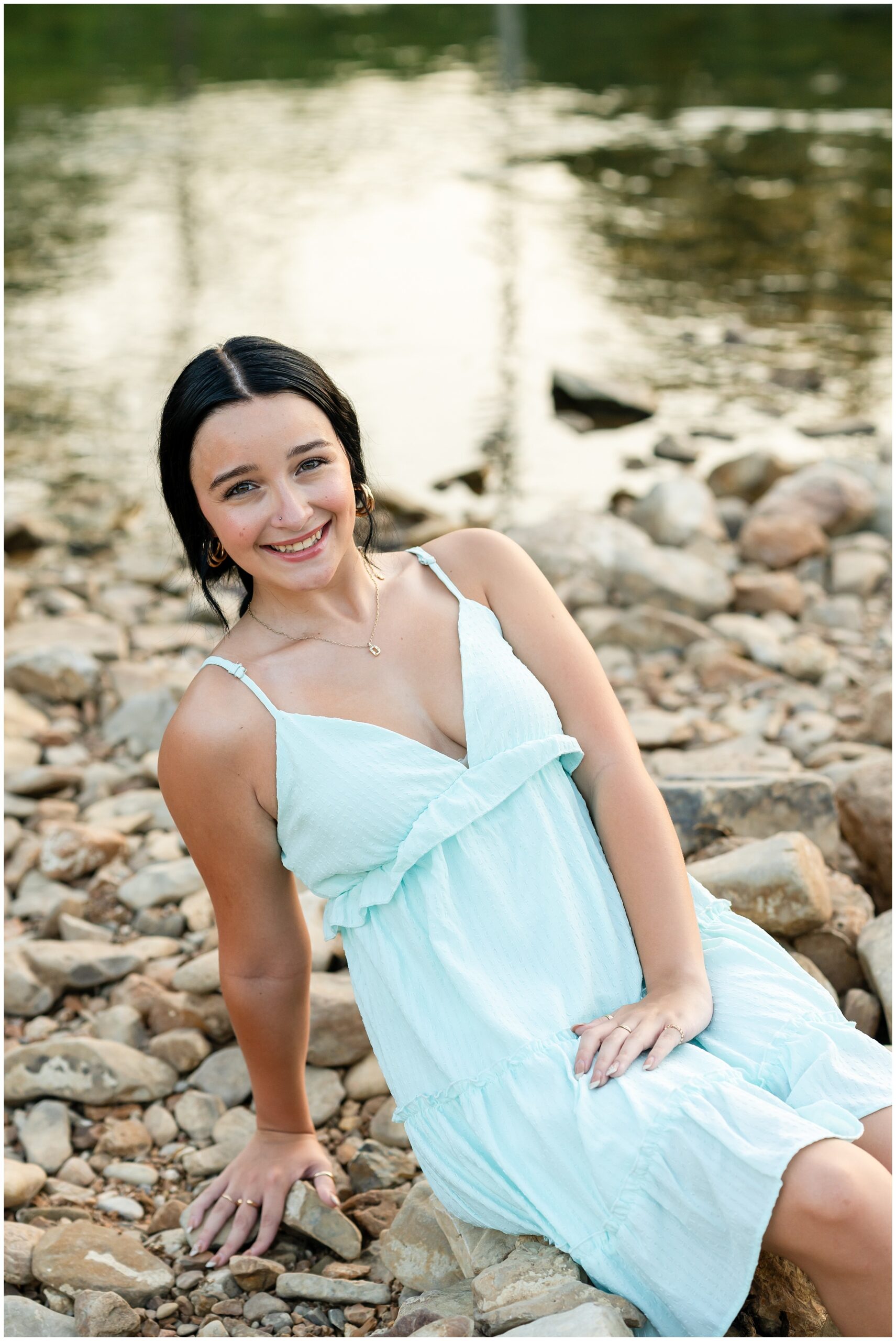 Highland High School senior, Dacy-Lynn, poses on a creek bank in beautiful Cherokee Village, AR for her senior session with North Arkansas Senior Photographer, Hannah Carr Photography.