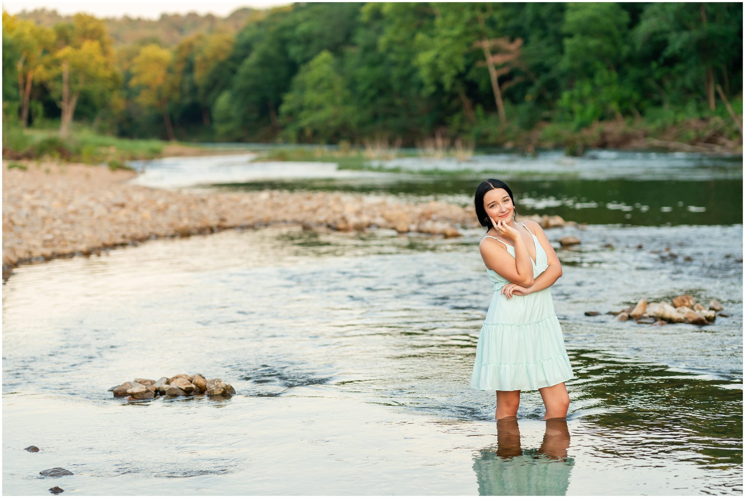 Highland High School senior, Dacy-Lynn, poses in a creek bank in beautiful Cherokee Village, AR for her senior session with North Arkansas Senior Photographer, Hannah Carr Photography.