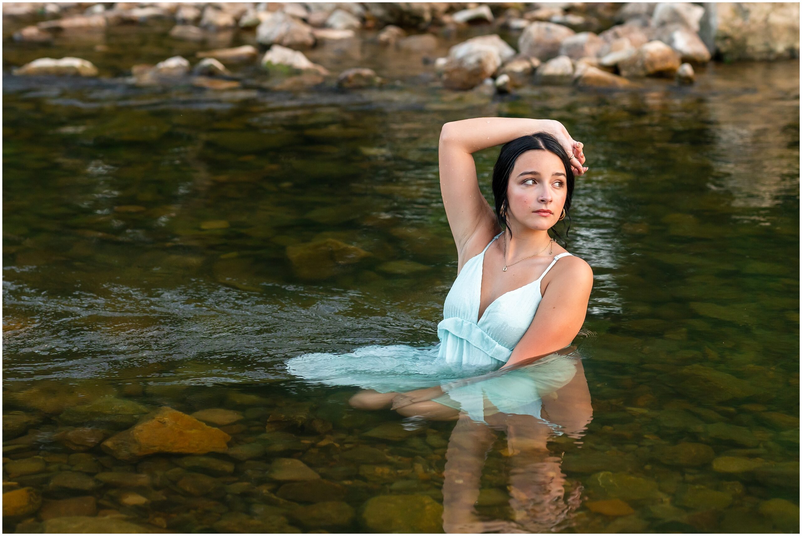Highland High School senior, Dacy-Lynn, poses in a creek bed in beautiful Cherokee Village, AR for her senior session with North Arkansas Senior Photographer, Hannah Carr Photography.